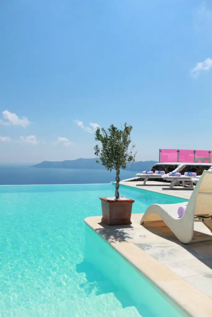 Swimming Pool near Body of Water Under Blue Sky